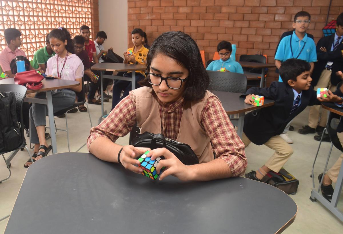 School children take part in a Rubik’s Cube challenge in Mangaluru.