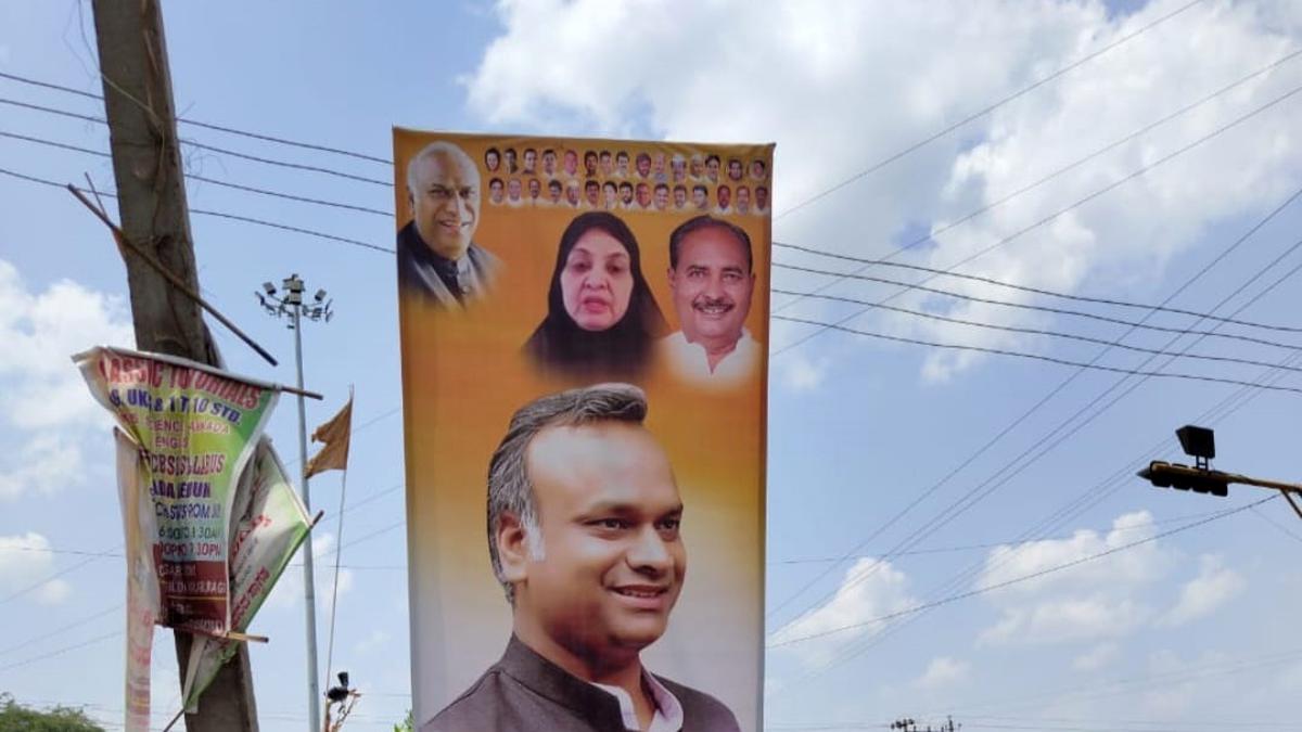 Minister pays fine as his supporters put up banner without civic body permission