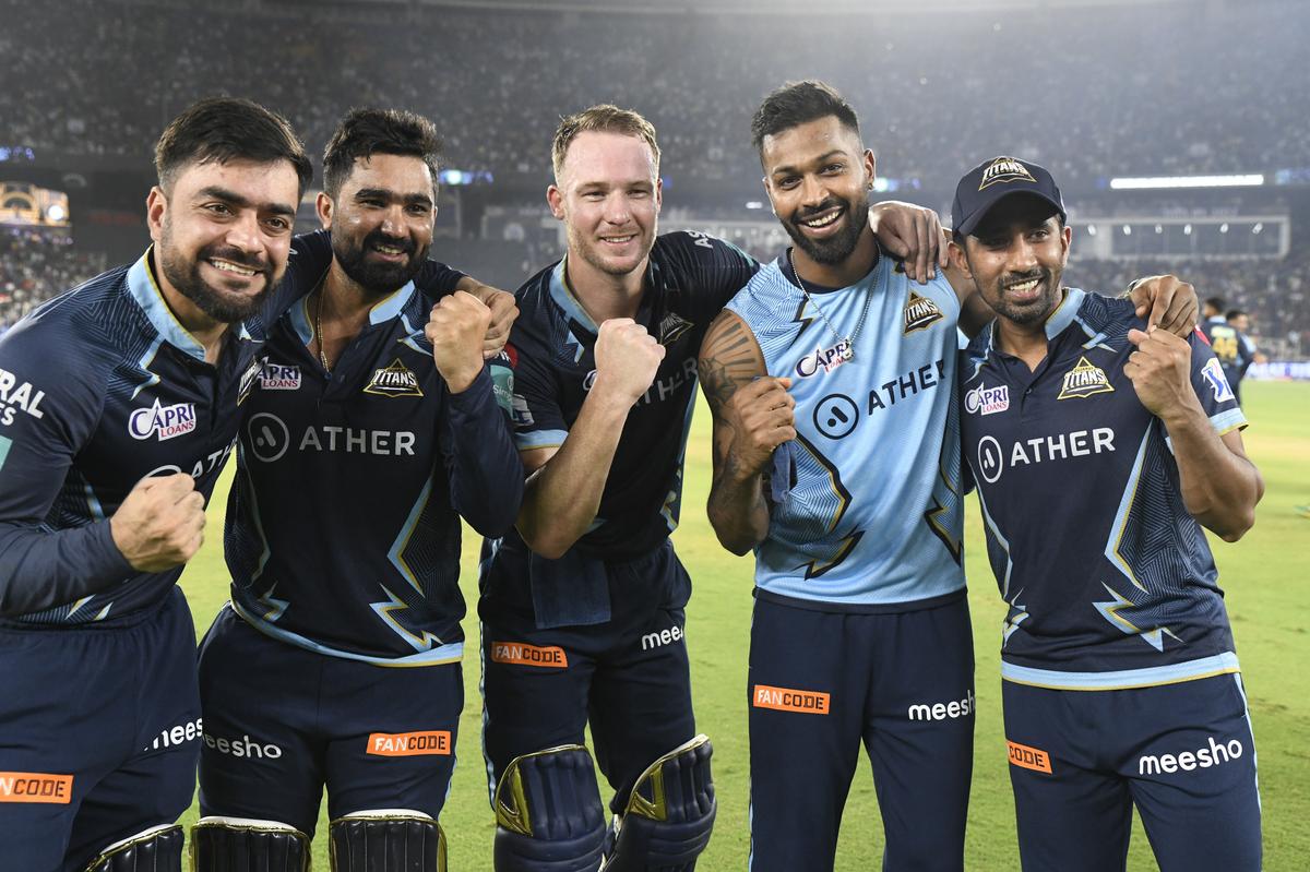 Gujarat Titans captain Hardik Pandya, Rashid Khan, David Miller, Rahul Tewatia and Wriddhiman Saha celebrate during the final of the TATA Indian Premier League 2022 (IPL season 15) between the Gujarat Titans and the Rajasthan Royals held at the Narendra Modi Stadium, Ahmedabad on May 29, 2022