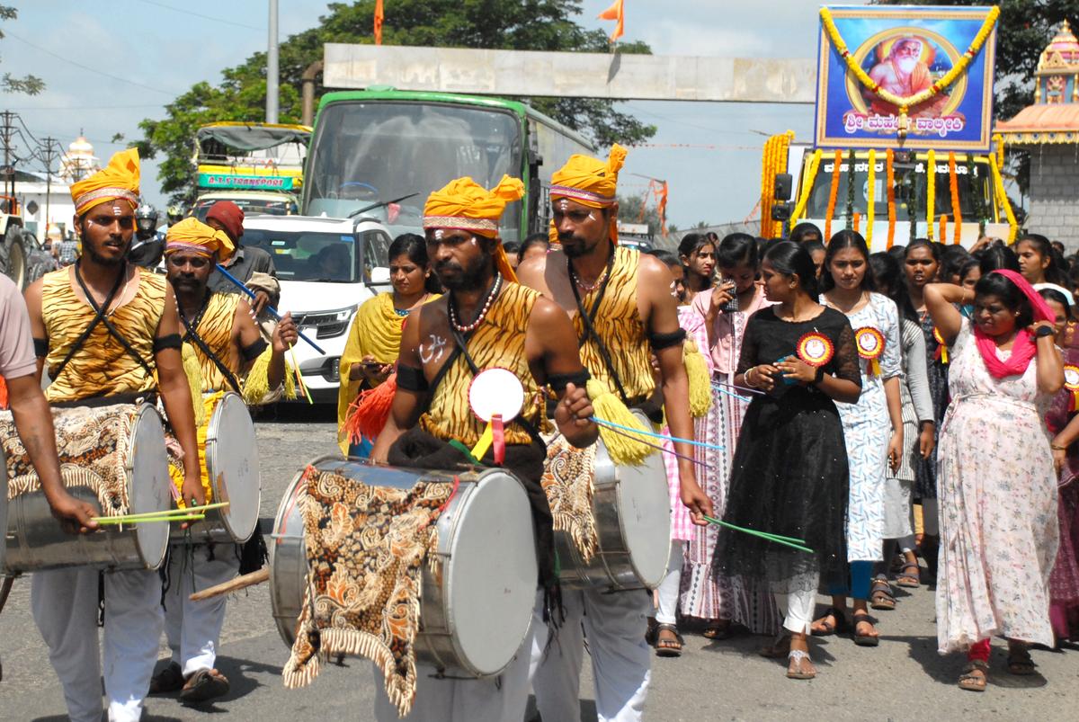 Folk troupes taking out a procession to mark Valmiki Jayanthi in Shivamogga on Tuesday.