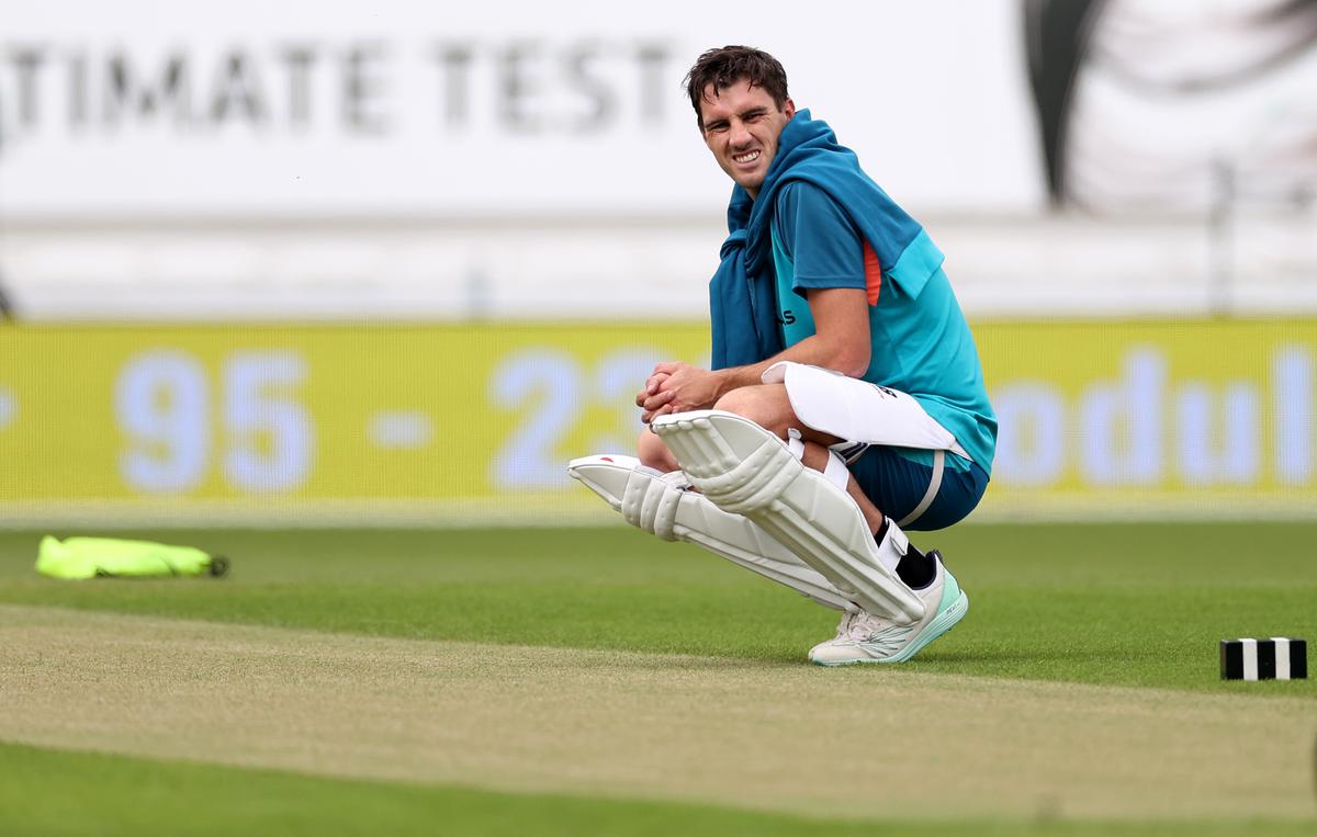 Pat Cummins of Australia inspects the pitch during Australia training prior to the ICC World Test Championship Final 2023 at The Oval on June 6, 2023 in London, England