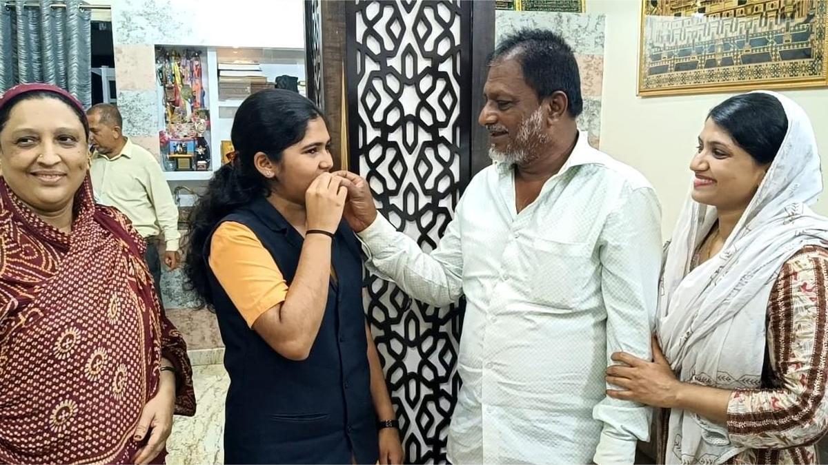 Mahin Khanum Afridi from Ayanur secures 596/600 in II PU