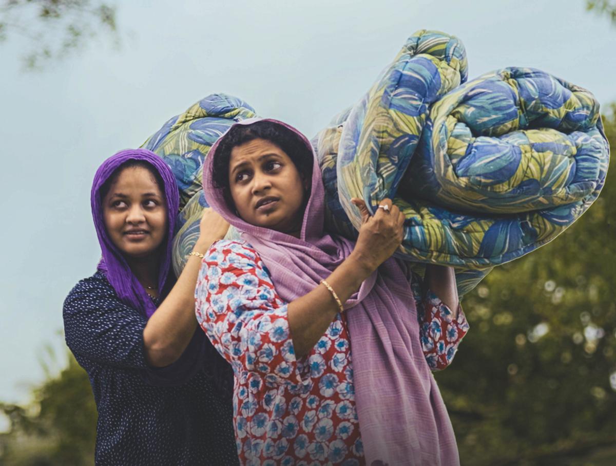 Shamla Hamza (left) and Viji Viswanath in Feminichi Fathima