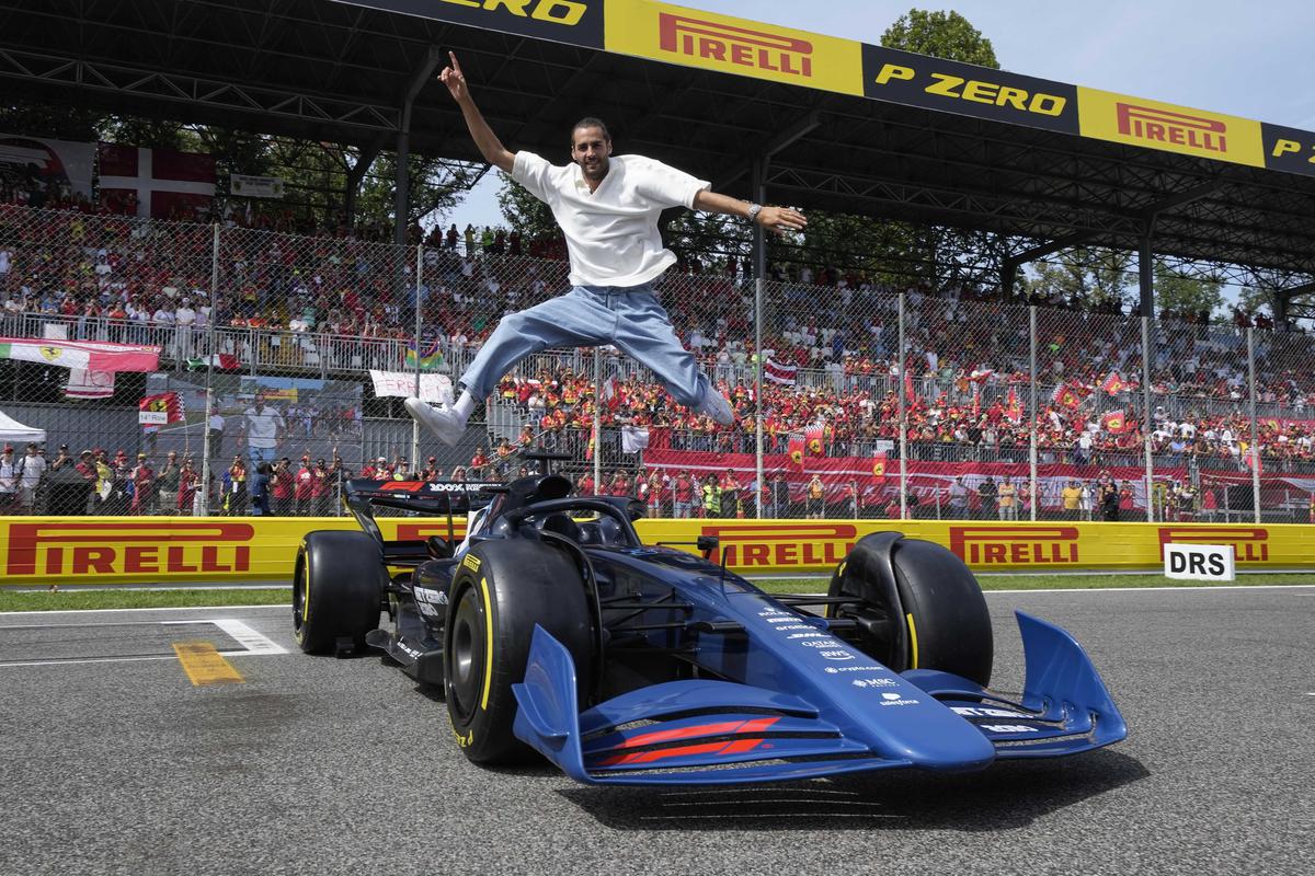 Human highlight reel: You can’t take your eyes off Gianmarco Tamberi, whether it’s his flamboyant athleticism on the track or his humorous antics off it. Here, he leaps over a Formula 1 car before the Italian GP in Monza.  