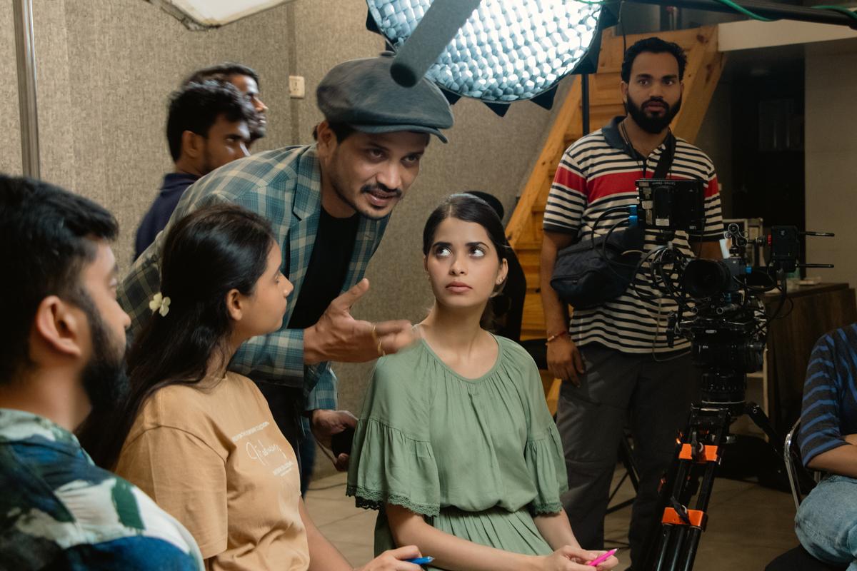 Director Ashwin Agarwal with his cast on the sets of Broken Mirror