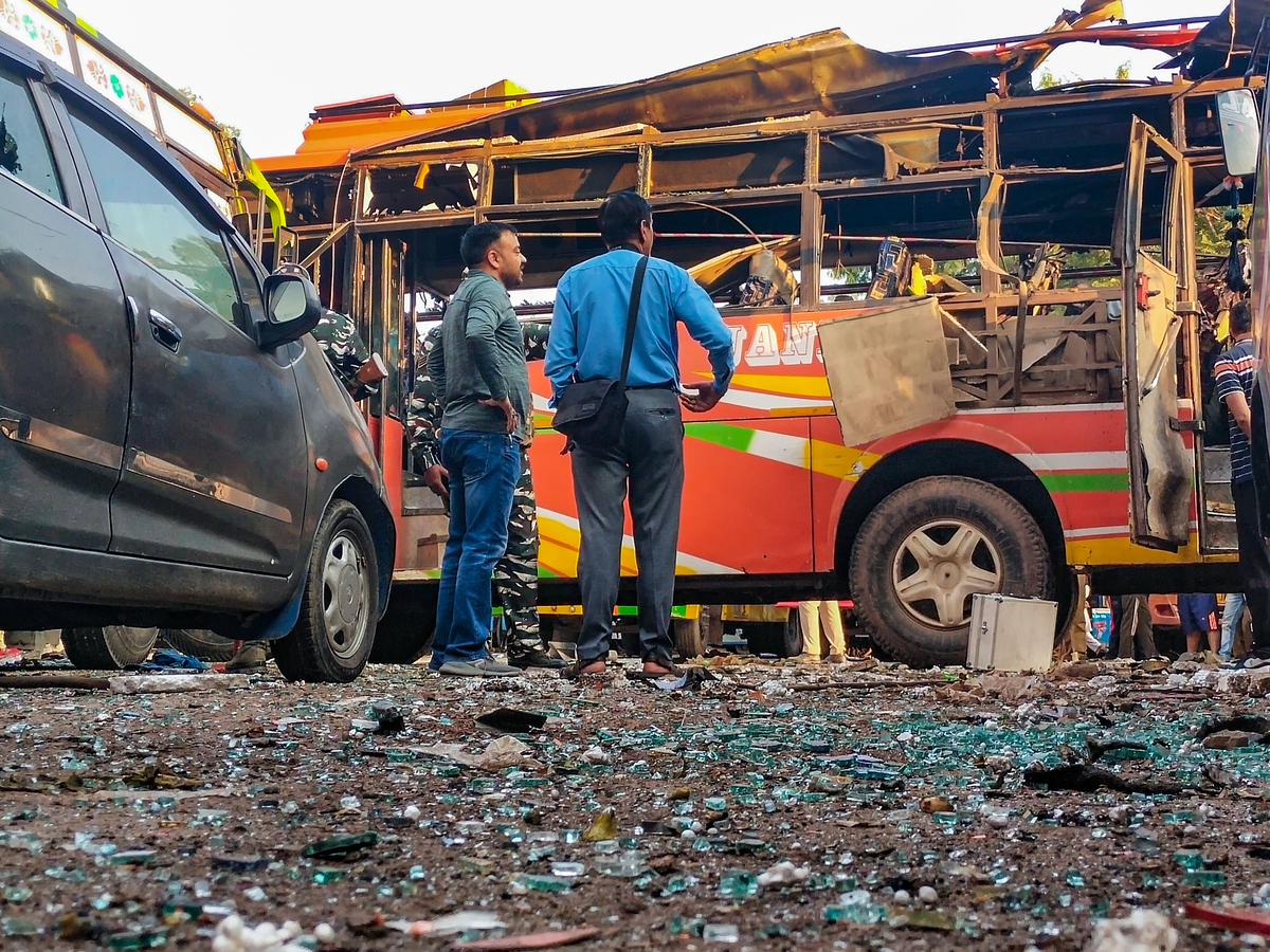 Bomb disposal squad members inspect after a blast took place in a bus parked at a bus stand in Udhampur, on Thursday morning, September 29, 2022. 