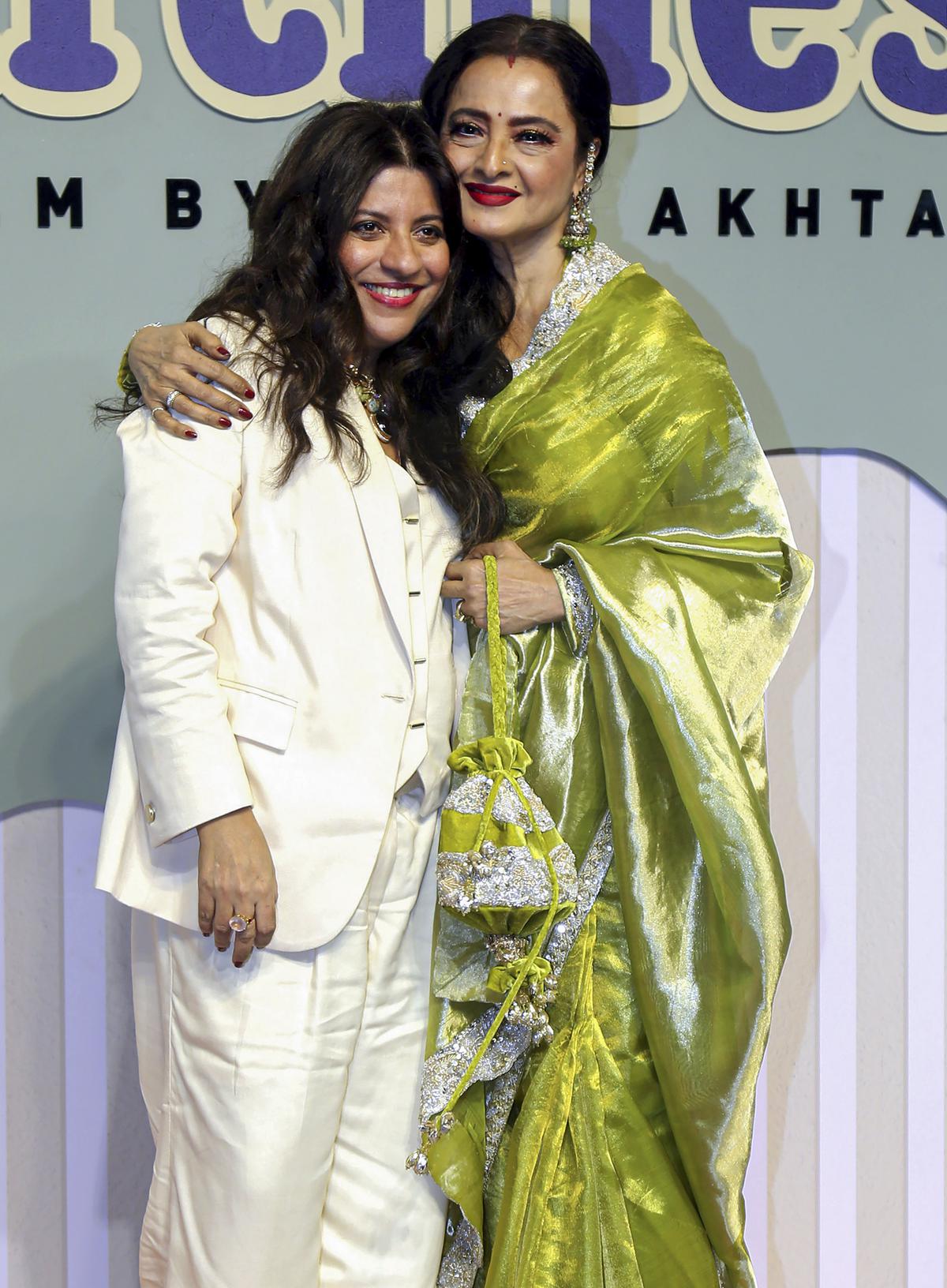 Mumbai: Film director and screenwriter Zoya Akhtar (L) and actor Rekha pose for photos at the premiere of Netflix’s film ‘The Archies’, in Mumbai, Tuesday, Dec. 5, 2023. 