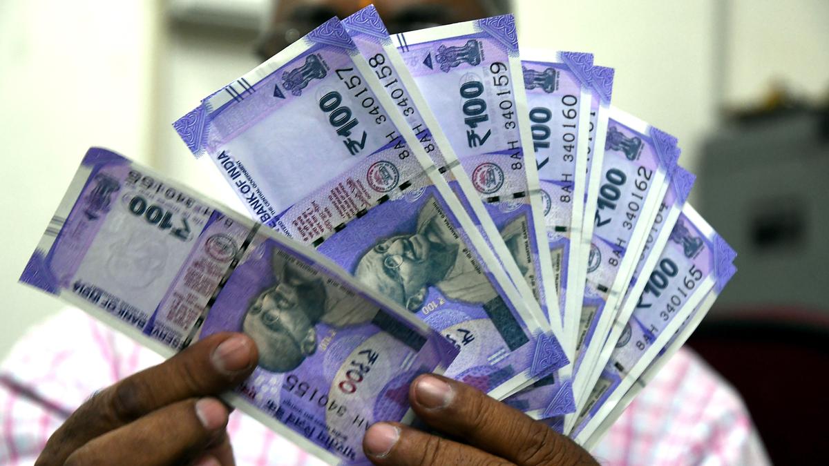 Rupee settles 4 paise lower at 83.50 against U.S. dollar