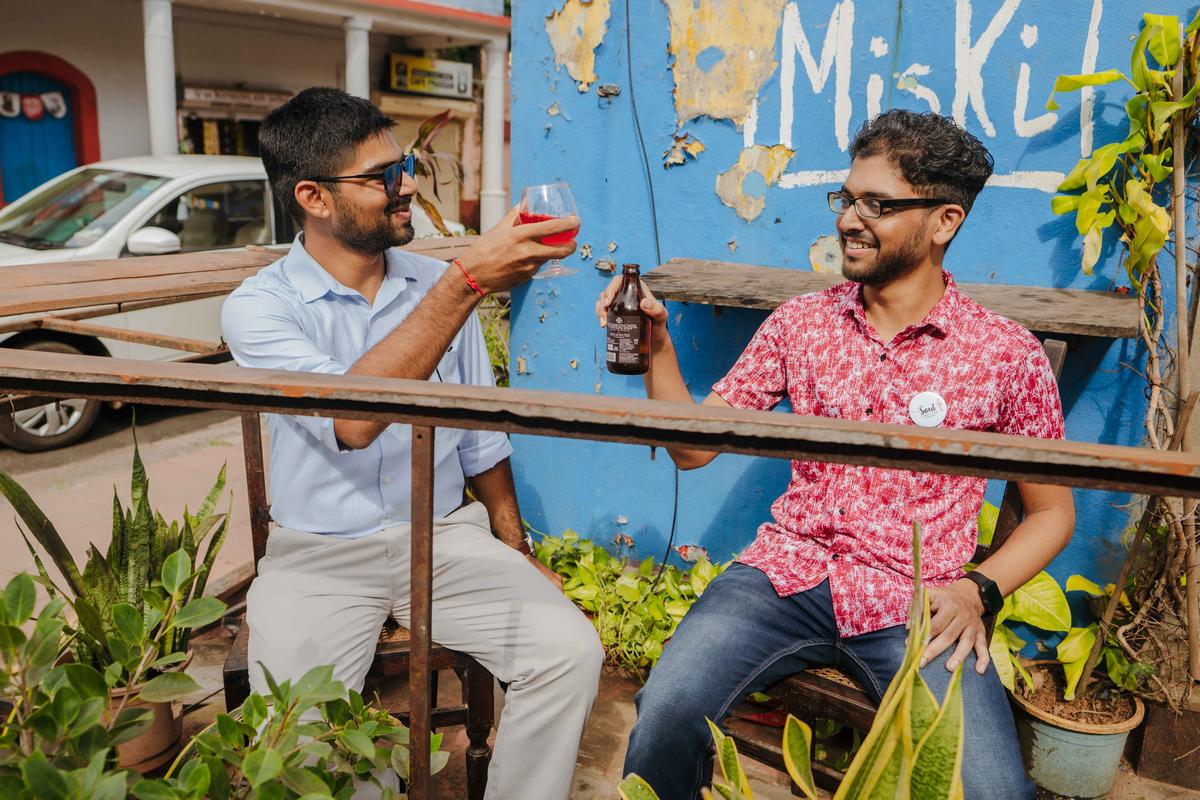 Travellers enjoying feni Travellers enjoying feni