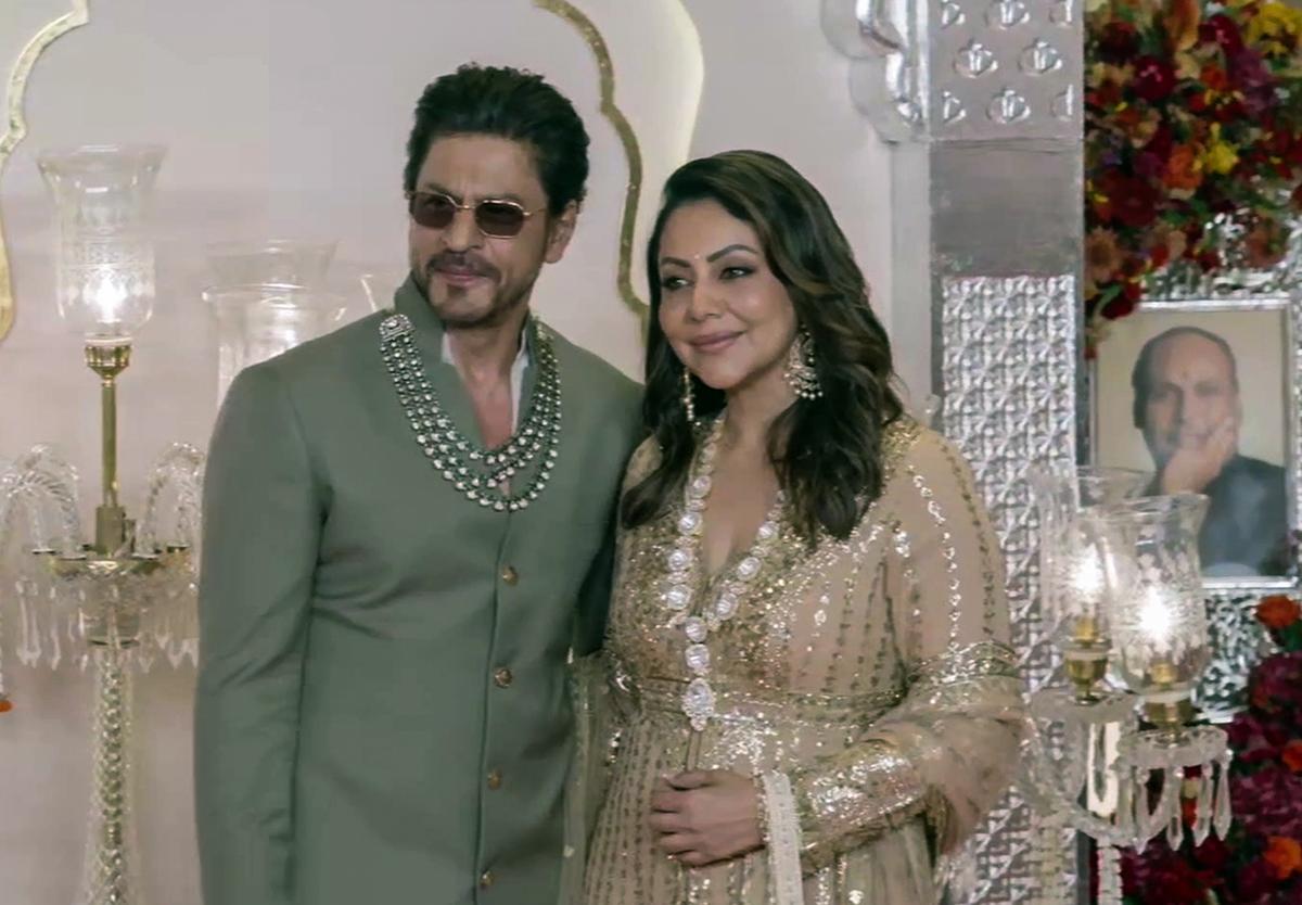 Bollywood actor Shah Rukh Khan along with his wife Gauri Khan arrived to attend the wedding of Reliance Industries Chairman Mukesh Ambani's son Anant Ambani and Radhika Merchant at the Jio World Convention Centre in Mumbai on Friday. Bollywood actor Shah Rukh Khan along with his wife Gauri Khan arrived to attend the wedding of Reliance Industries Chairman Mukesh Ambani's son Anant Ambani and Radhika Merchant at the Jio World Convention Centre in Mumbai on Friday.