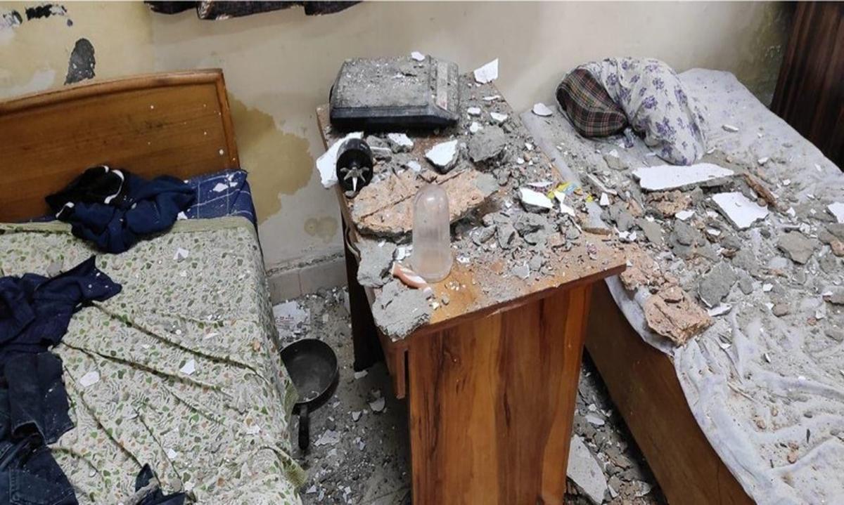 Debris from a ceiling strewn on beds inside a hostel room on the MAMC campus. Debris from a ceiling strewn on beds inside a hostel room on the MAMC campus.