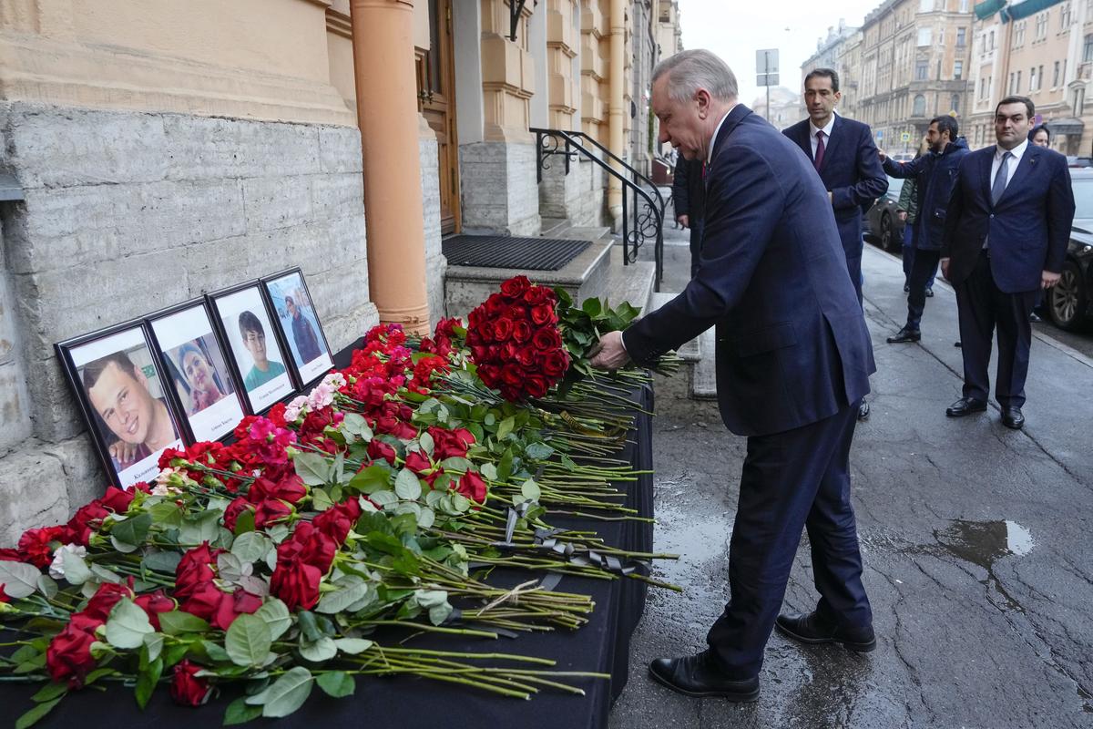 St. Petersburg Governor Alexander Beglov lays a bunch of flowers at the Consulate of Azerbaijan in the memory of victims of the Azerbaijan Airlines’ Embraer 190 that crashed near the Kazakhstan’s airport of Aktau, in St. Petersburg, Russia, on December 26, 2024.