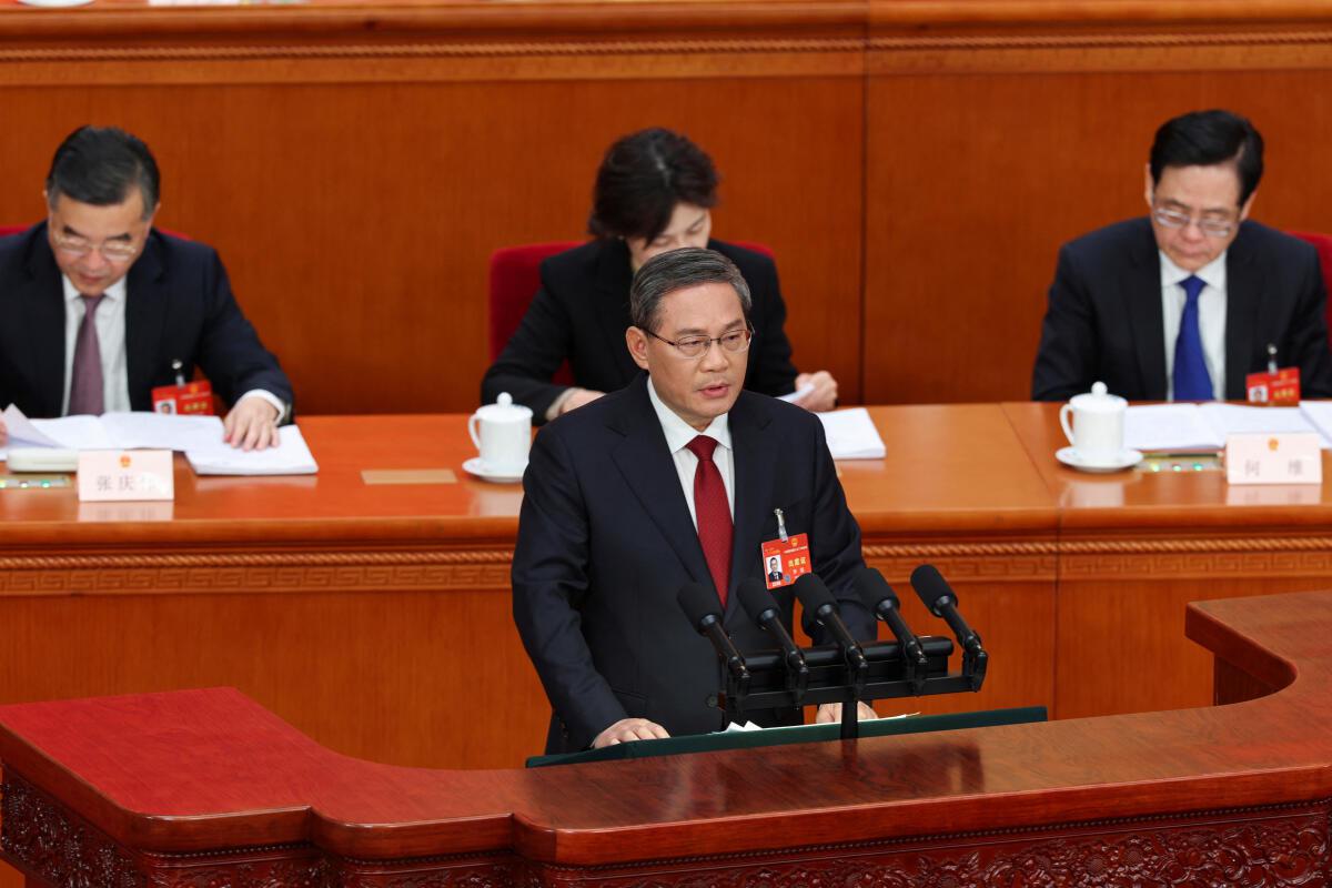 Chinese Premier Li Qiang delivers the work report at the opening session of the National People’s Congress (NPC) at the Great Hall of the People in Beijing, China March 5, 2024.