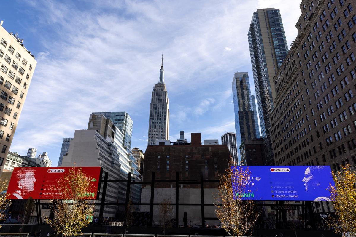 Photos of US presidential candidates, former US President Donald Trump and US Vice President Kamala Harris, were displayed on billboards in New York City.