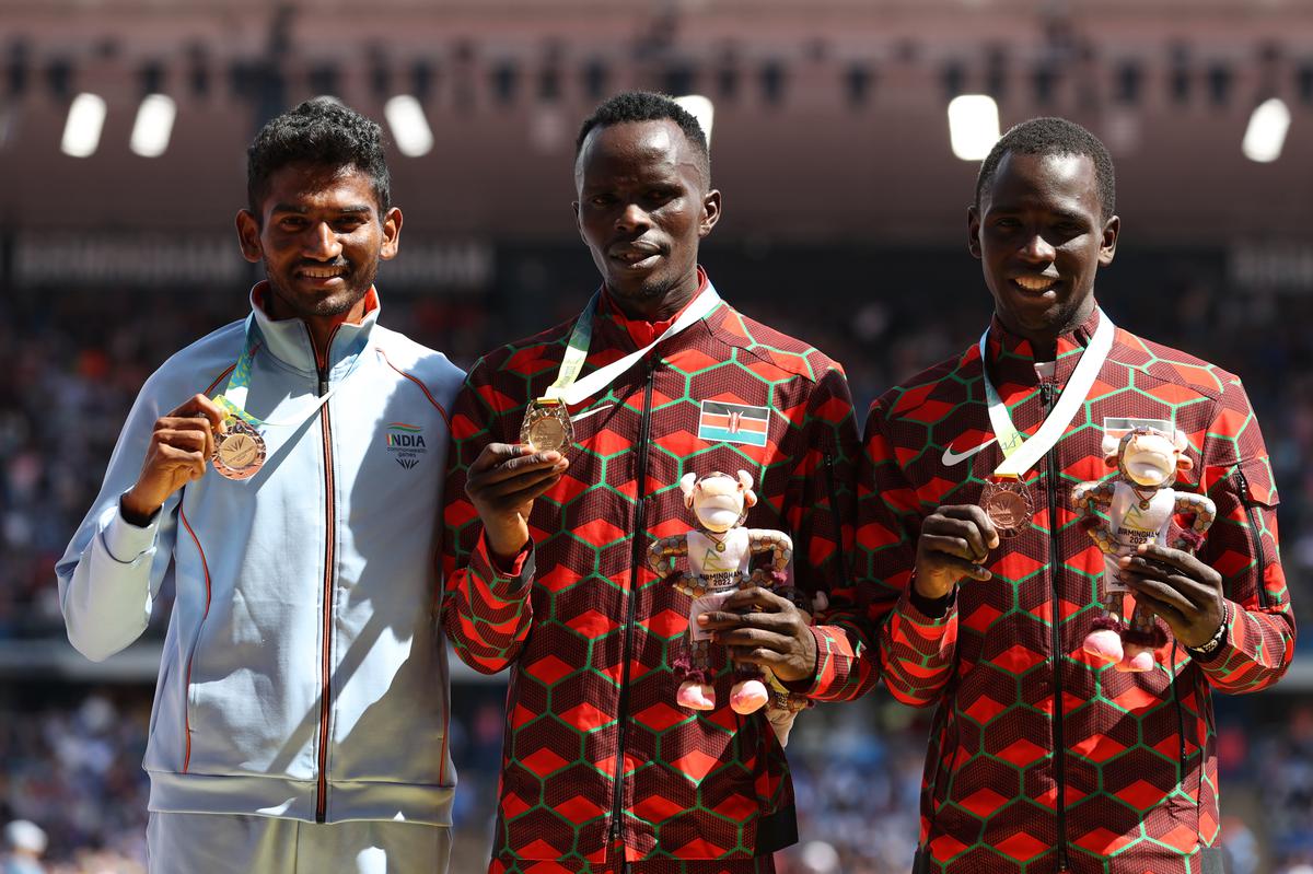 Silver medallist Avinash  Sable of India, gold medallist Abraham Kibiwot of Kenya and bronze medallist Amos Serem of Kenya during the medal ceremony for the men’s 3000m steeplechase final of the 2022 Commonwealth Games on August 06, 2022 in Birmingham.