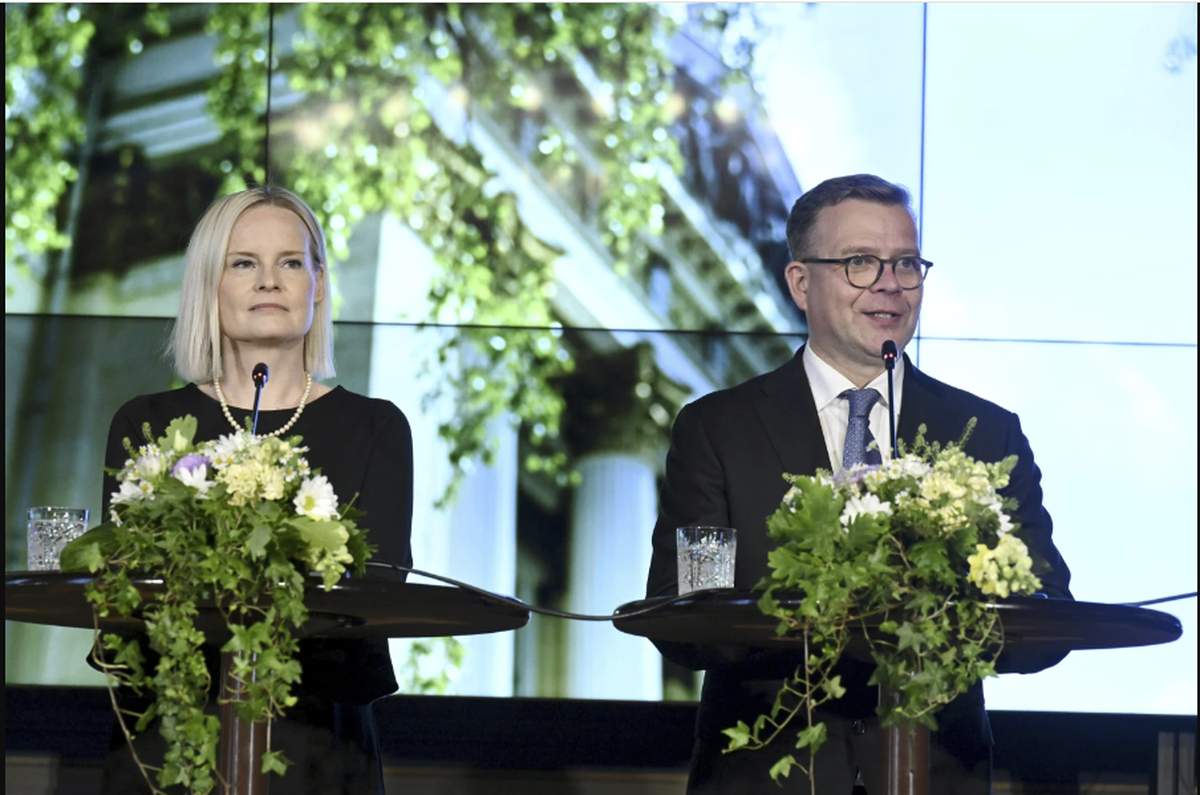  The new government of Finland led by Prime Minister Petteri Orpo, right, and the new Minister of Finance Riikka Purra hold a press conference in Helsinki, Finland on June 20, 2023