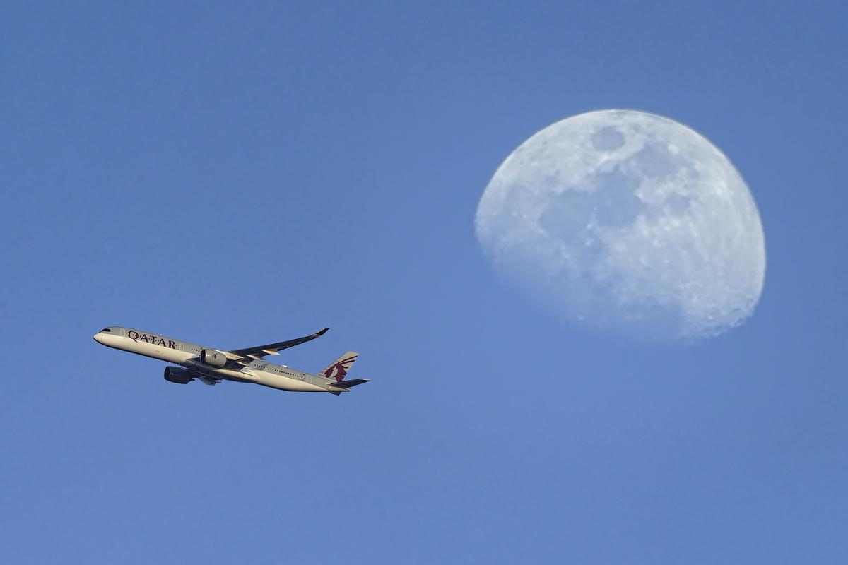 Qatar Airways aero plane takeoff over Doha Sky