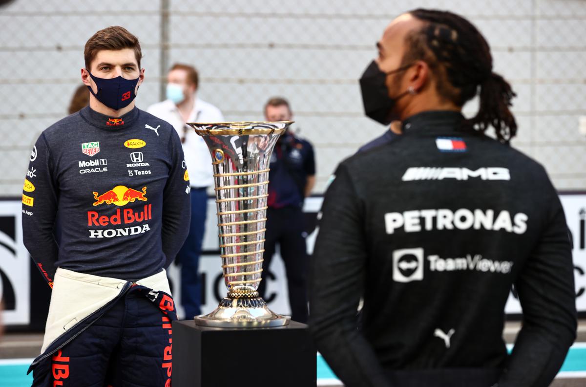 Max Verstappen and Lewis Hamilton before the start of the Abu Dhabi Grand Prix in December 2021.