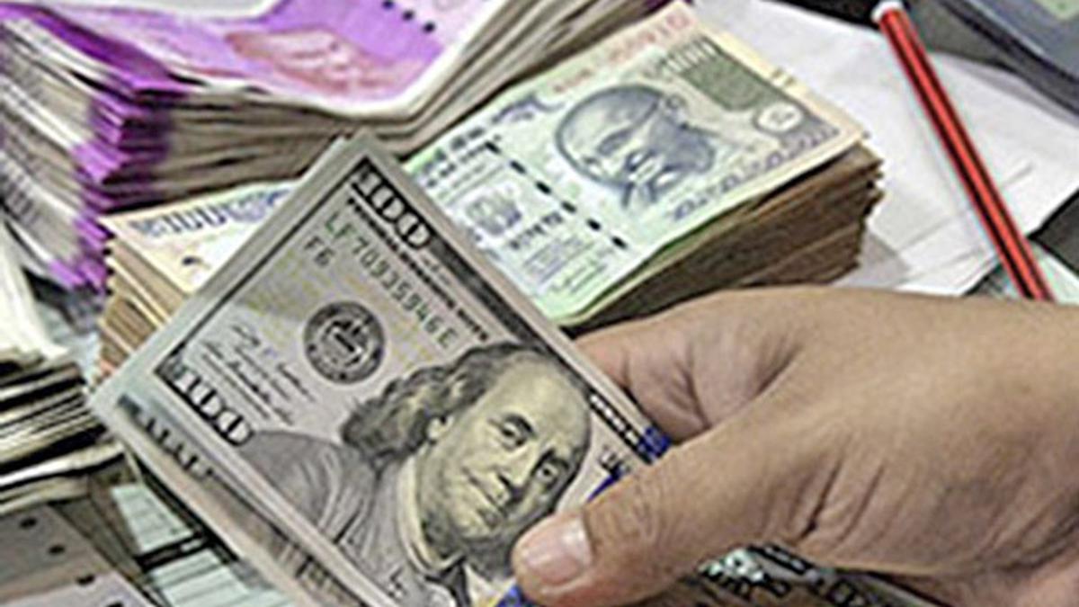 Rupee falls 14 paise to close at 82.84 against U.S. dollar
