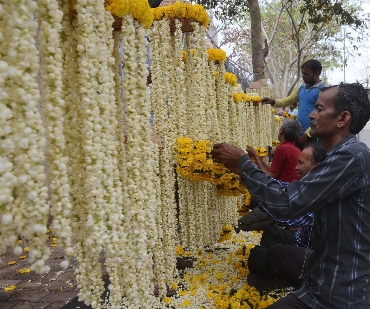 People busy making decorative items at the Ghazipur Flower Wholesale Market, in New Delhi
Photo: Sandeep Saxena People busy making decorative items at the Ghazipur Flower Wholesale Market, in New Delhi
Photo: Sandeep Saxena