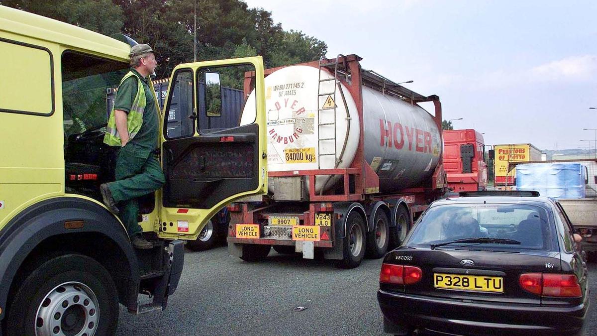 U.K. cancels a planned rise in motor fuel tax