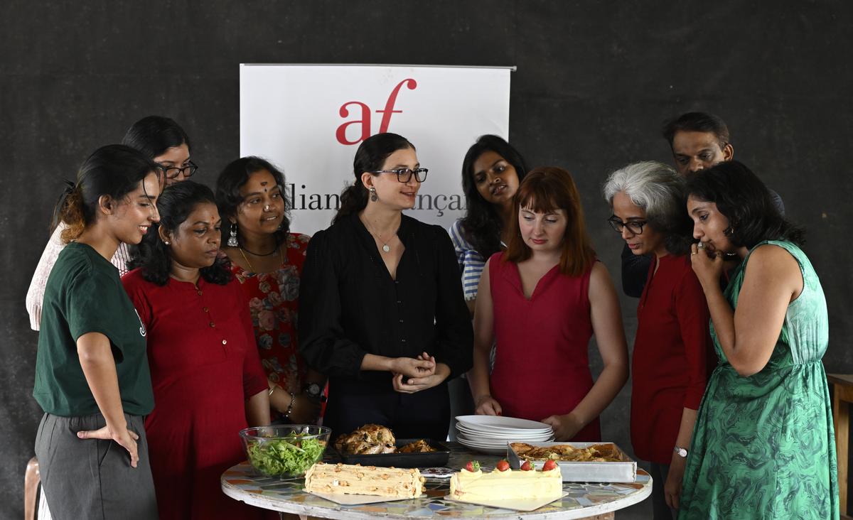 
Margot Michaud(centre) with members and staff at Alliance Française De Trivandrum Christmas celebration