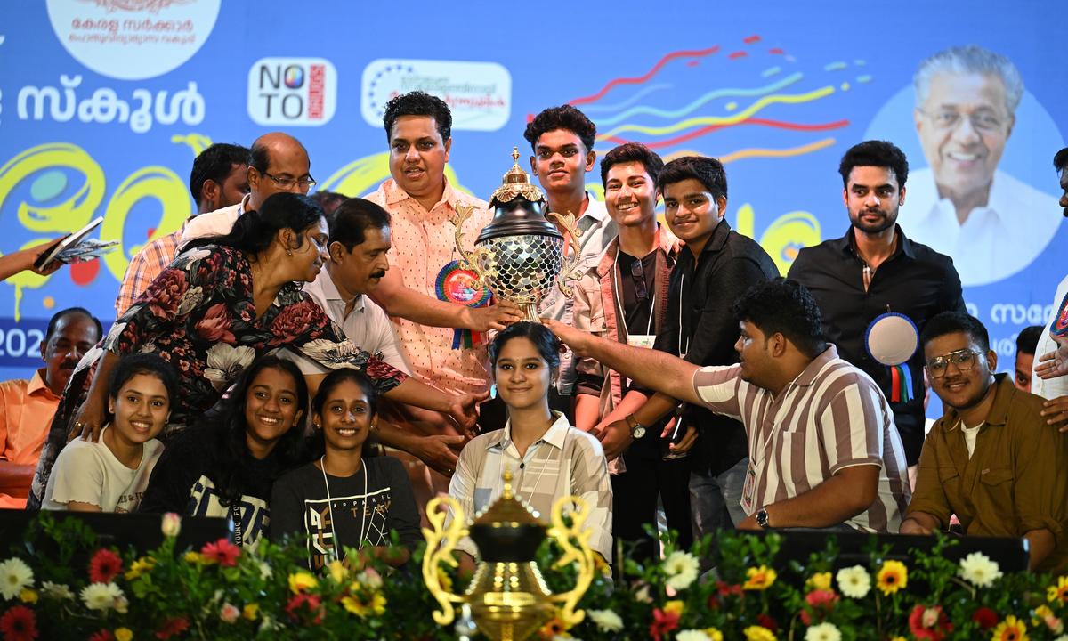 BSS Gurukulam Higher Secondary School, Alathur, Palakkad, lifts championship trophy for the best school of 63rd State School Arts Festival at Central Stadium in Thiruvananthapuram on Wednesday.  