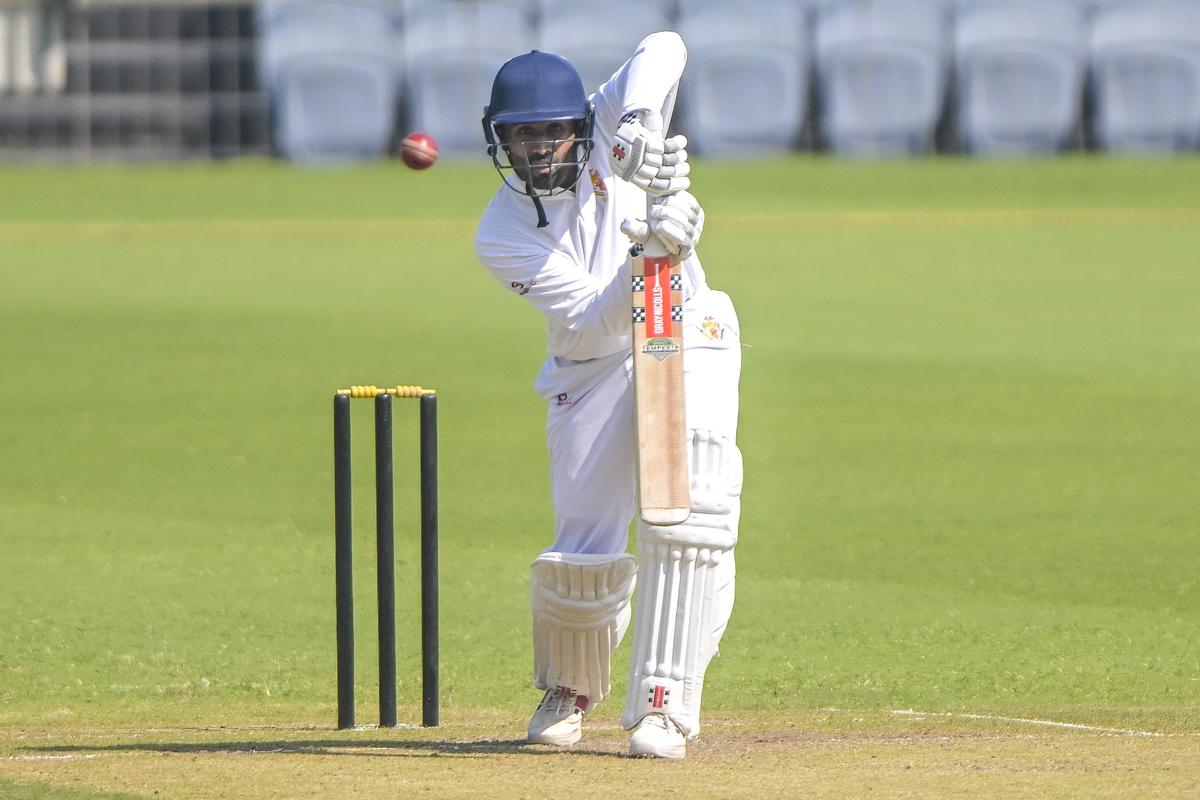 Karnataka’s Shreyas Gopal plays a shot on the second day of the Ranji Trophy match against Maharashtra at the MCA Stadium in Pune on Sunday, November 9, 2025.