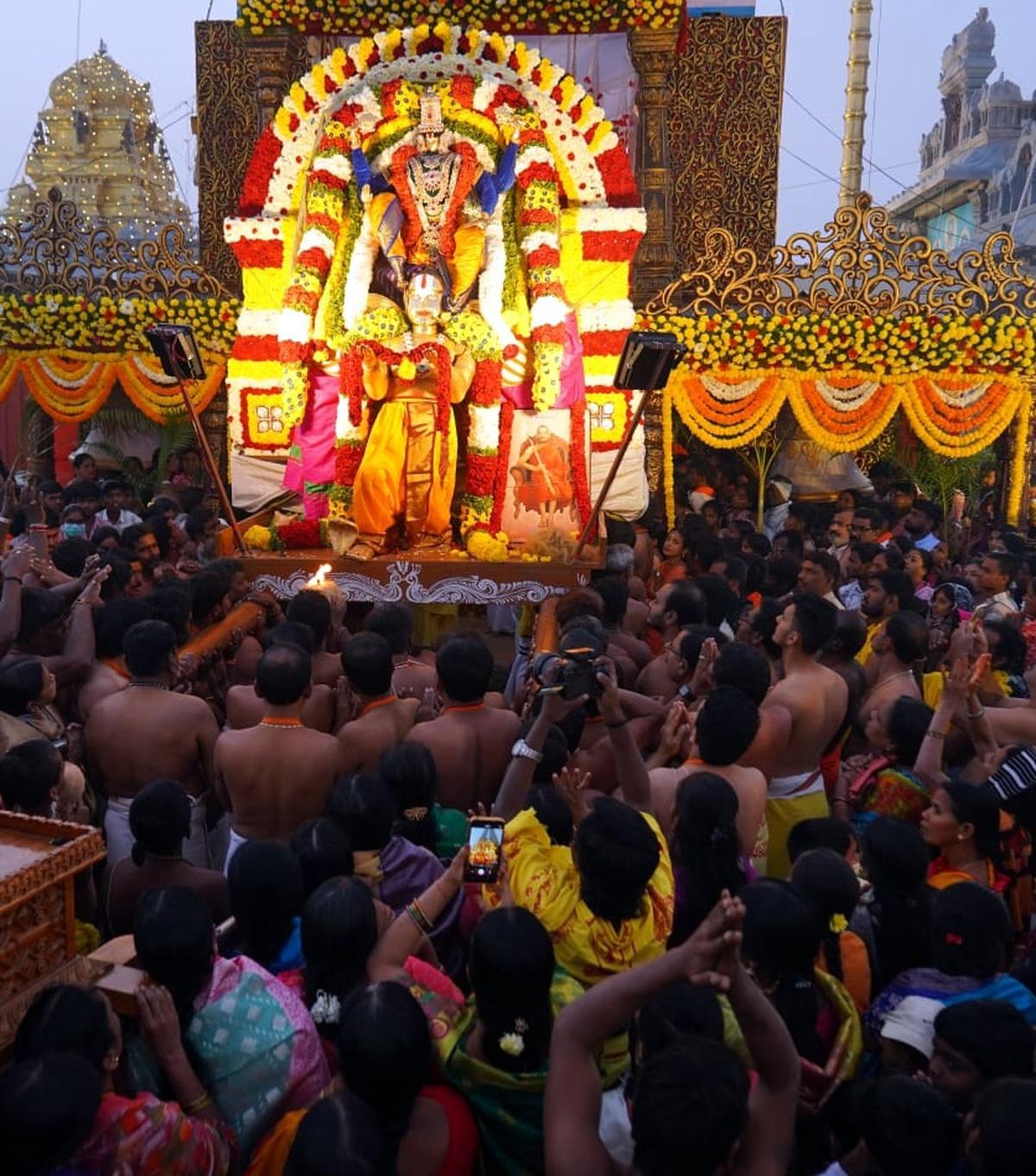 Devotees visit Sri Mahalaxmi Godha Sametha Virat Venkateshwara Swami Temple Vaikuntapuram on the occasion of Vaikuntha Ekadashi in Sangareddy on Friday.
