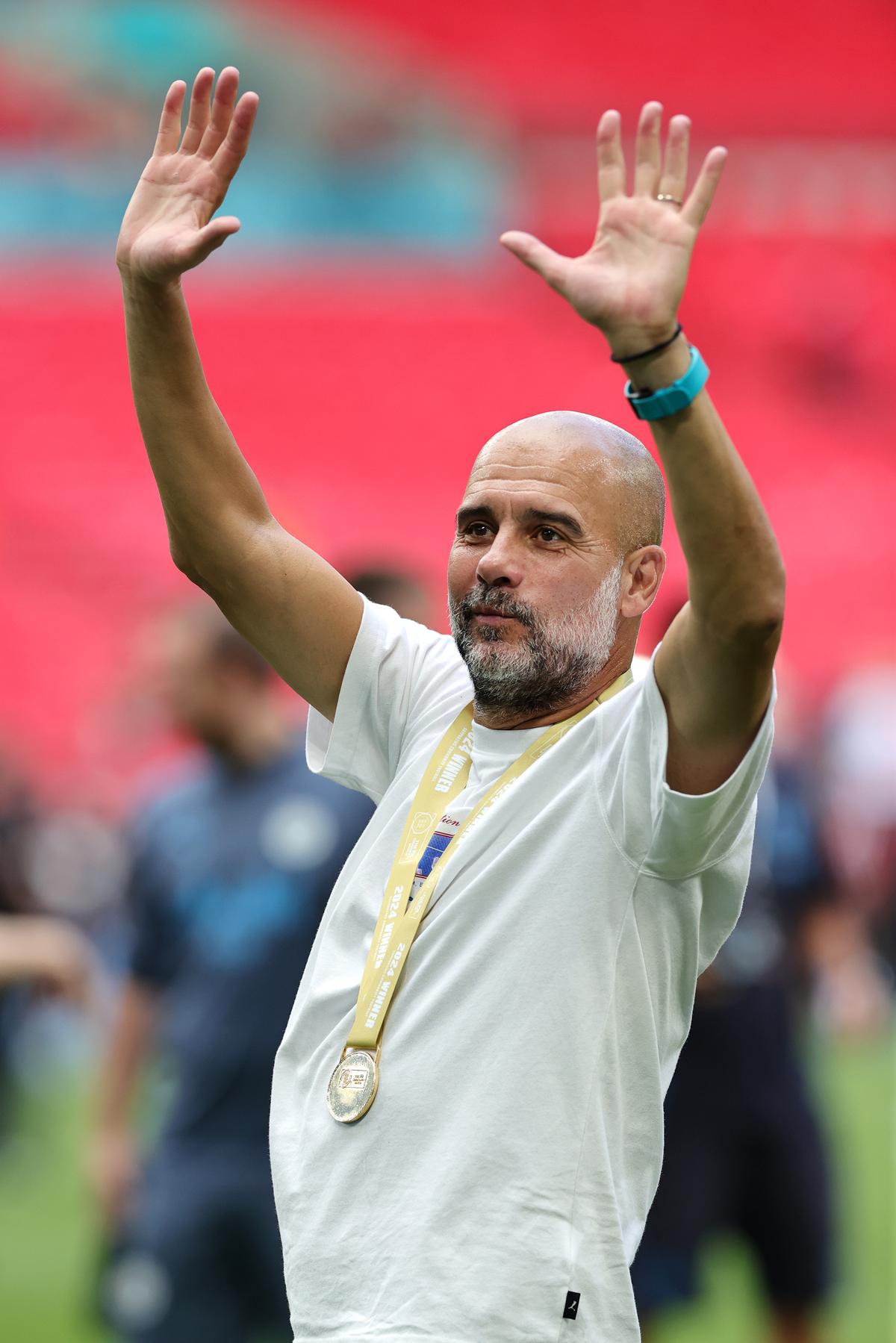 Pep Guardiola, Manager of Manchester City celbrates following his team’s victory in the penalty shootout during the 2024 FA Community Shield match between Manchester United and Manchester City at Wembley Stadium on August 10, 2024 in London, England. 