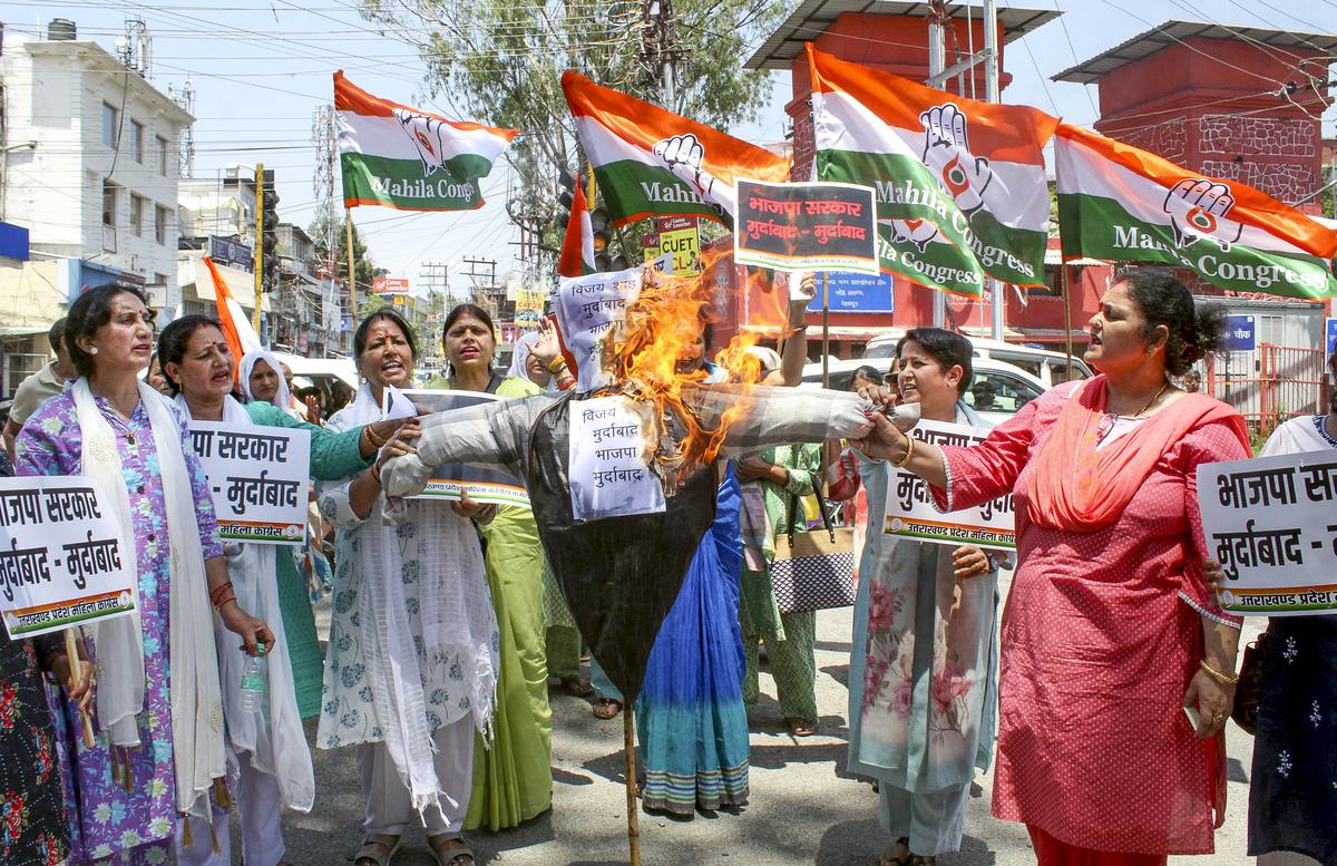 Uttarakhand State Women Congress President Jyoti Rautela and supporters burn an effigy during a protest against senior BJP leader Vijay Shah’s remarks on Col. Sofia Qureshi Uttarakhand State Women Congress President Jyoti Rautela and supporters burn an effigy during a protest against senior BJP leader Vijay Shah’s remarks on Col. Sofia Qureshi