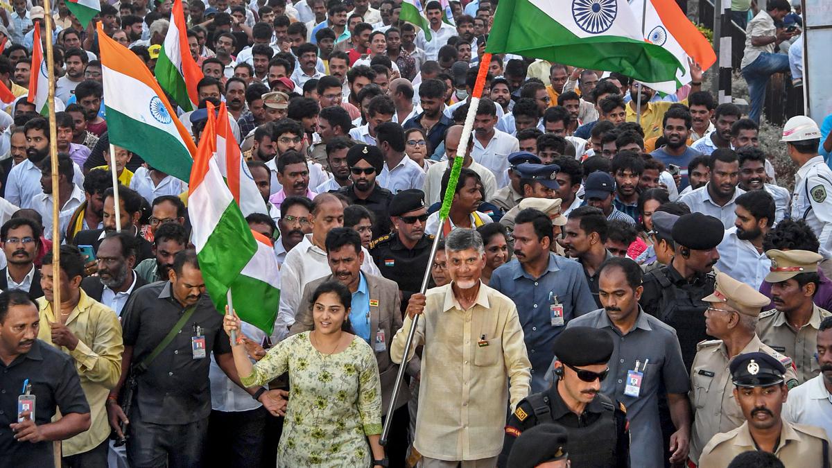 Carrying Tricolours, hundreds walk along with Naidu on Beach Road in Vizag
