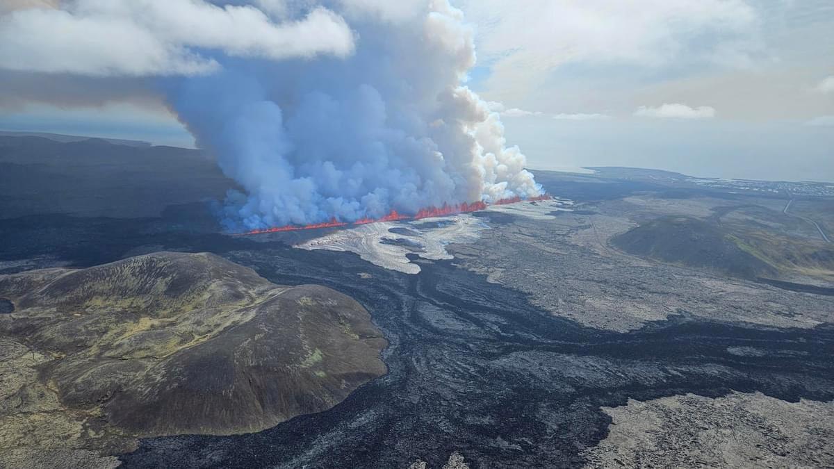 An Iceland volcano starts erupting again, shooting lava into the sky