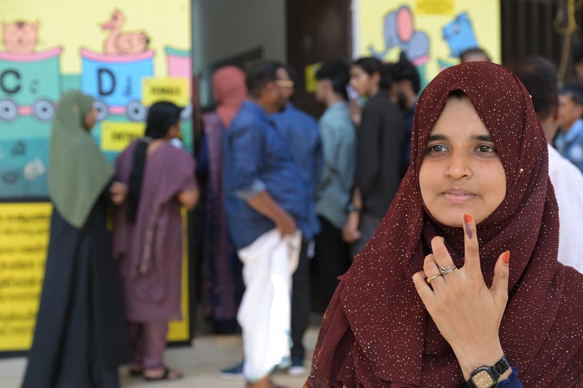 A voter showing her ink-smeared finger after casting vote at KKMLP school Alathur, near Palakkad town on Friday.