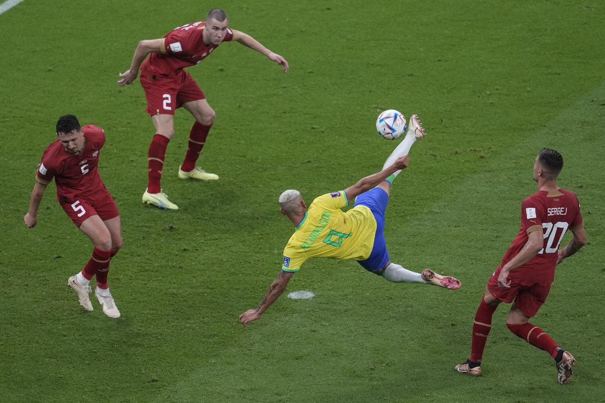 Richarlison of Brazil scores his team's second goal against Serbia in the World Cup group G match between Brazil and Serbia, at the Lusail Stadium in Lusail, Qatar on November 24, 2022
