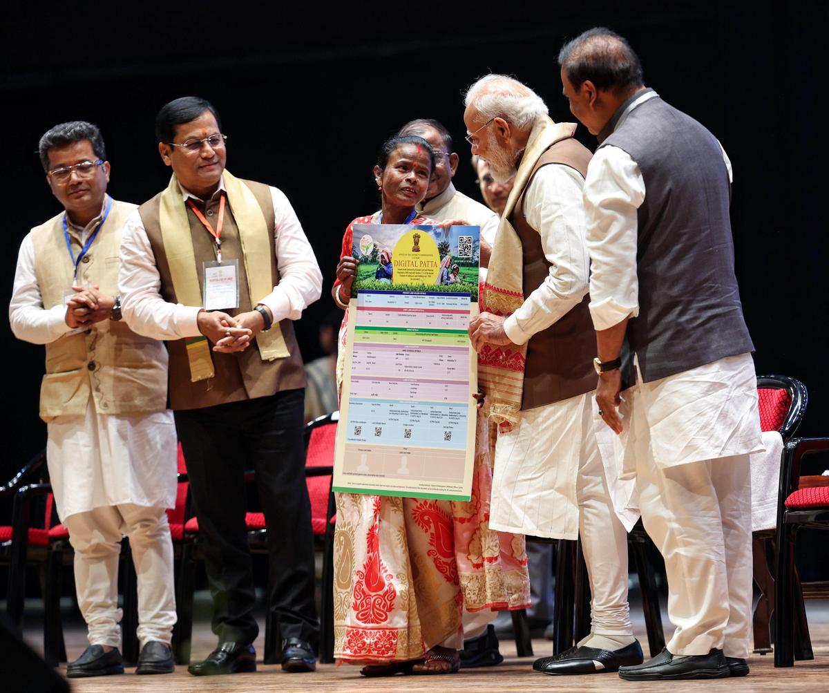 PM distributes land deeds to Assam's tea workers - The Hindu