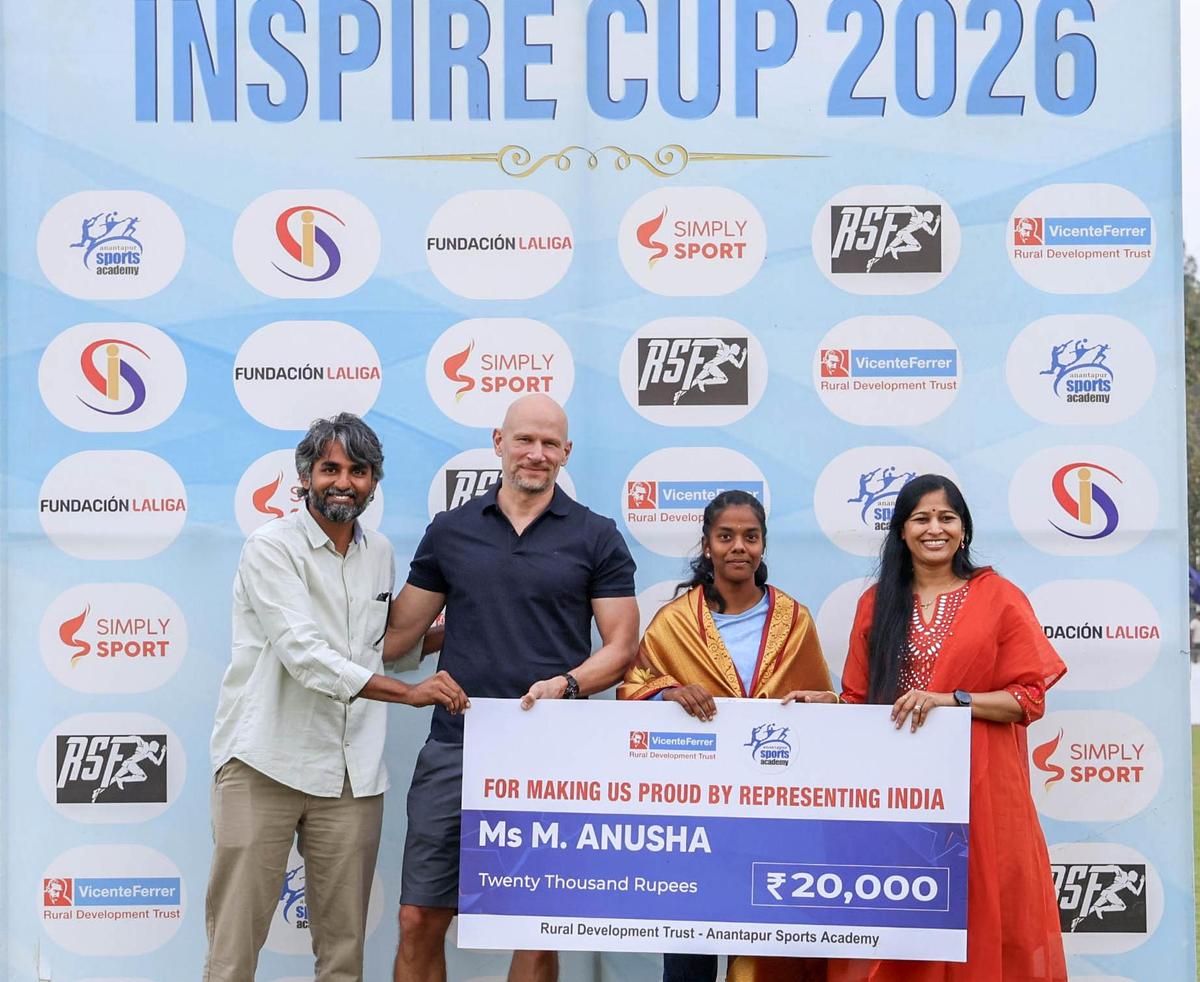 M. Anusha, who represented India in the international friendly against the Maldives, being felicitated at the closing ceremony of the Inspire Cup held recently in Anantapur. 