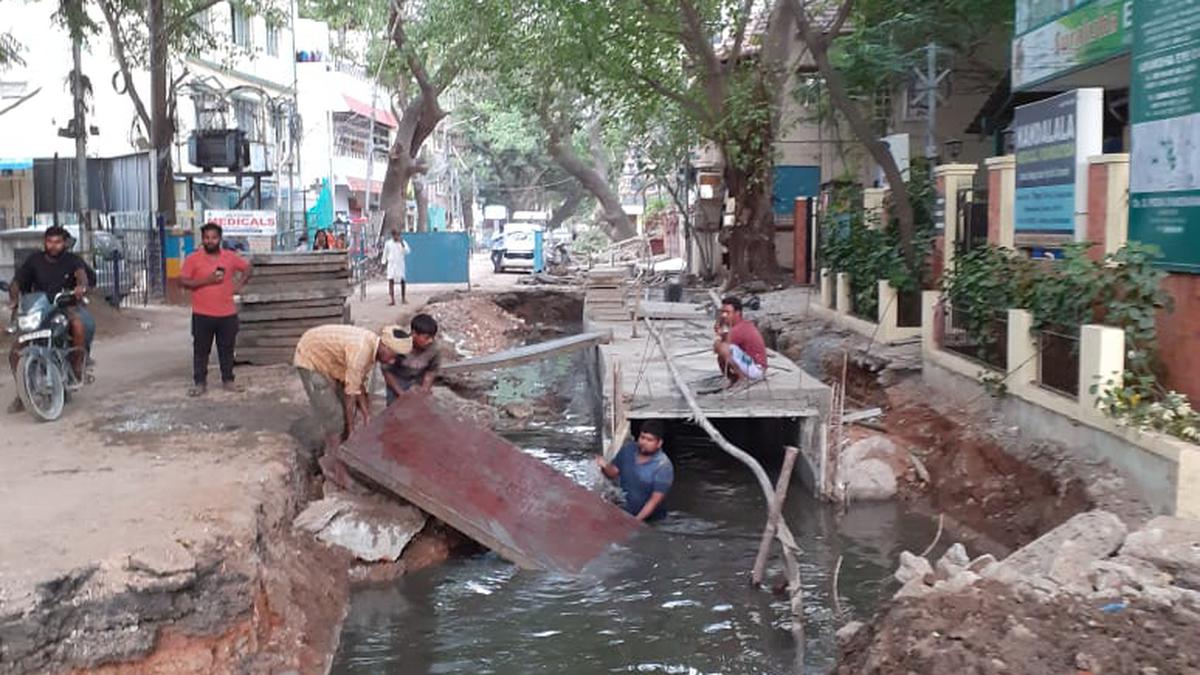 Sewage intrudes on SWD work on a section of Dr Ranga Road; residents angry over frequent breakdown of utility services