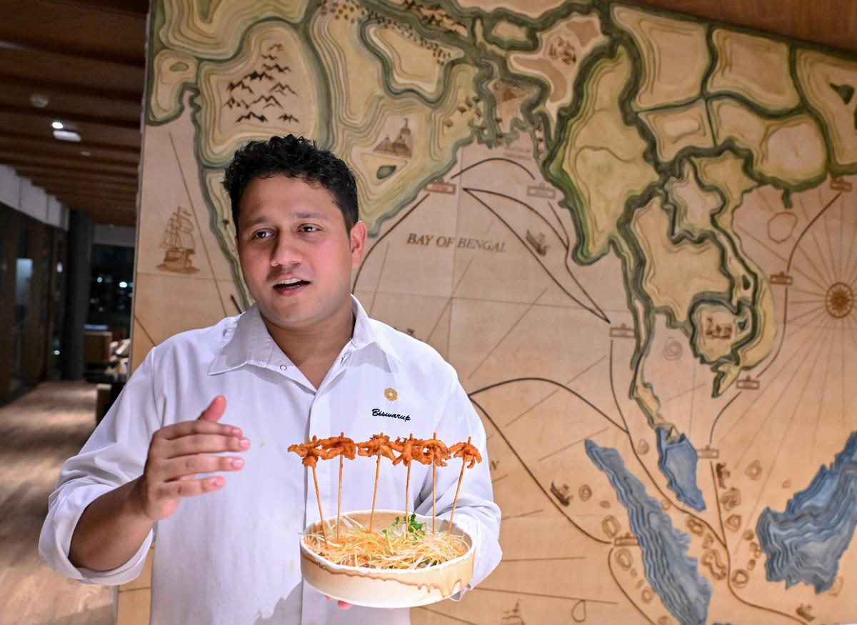 Executive chef Biswarup Chatterjee explaining about the squid lollypop at Jaatra restaurant at Taj Puri Resort and Spa in Puri. Executive chef Biswarup Chatterjee explaining about the squid lollypop at Jaatra restaurant at Taj Puri Resort and Spa in Puri.