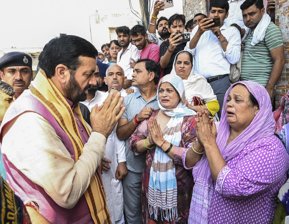 Haryana Chief Minister Nayab Saini meets the family members of ASI Sandeep Lather, in Rohtak.
