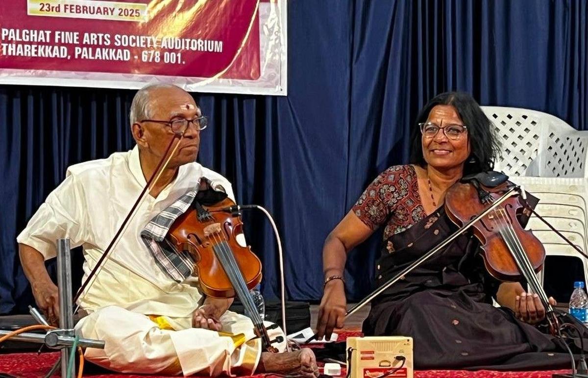 The violinist with daughter V. Sindhu. The violinist with daughter V. Sindhu.