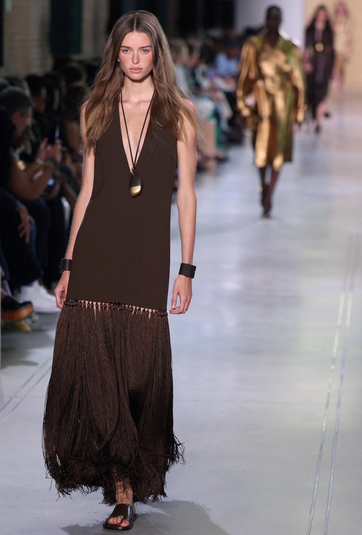 A model presents a creation from the Michael Kors Spring 2026 collection. 