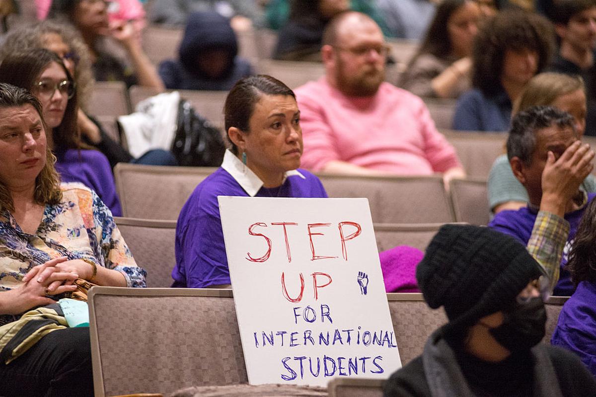Northwestern University faculty and students at a protest gathering in April. Northwestern University faculty and students at a protest gathering in April.