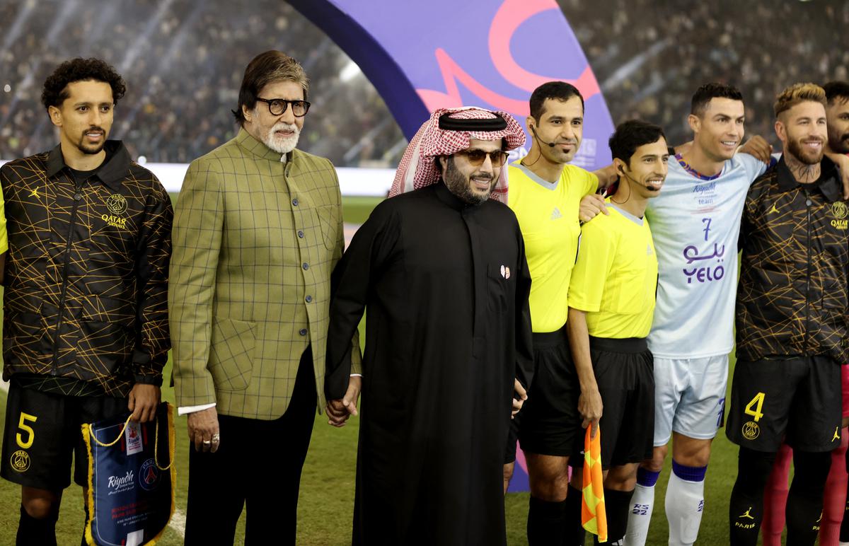 Saudi Pro League XI’s Cristiano Ronaldo, Turki Sheikh, head of the Entertainment Authority, and Indian actor Amitabh Bachchan before the match.