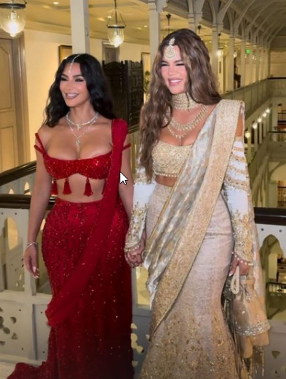 American media personalities and sisters Kim Kardashian and Khloe Kardashian arrive to attend Anant Ambani and Radhika Merchant’s wedding, in Mumbai