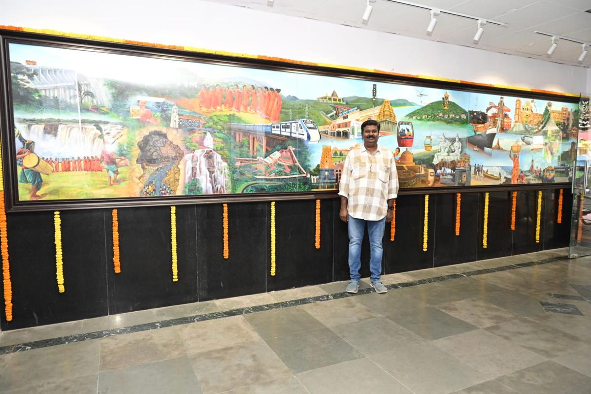 Artist Moka Vijay Kumar with his acrylic painting at DRM office in Visakhapatnam. 