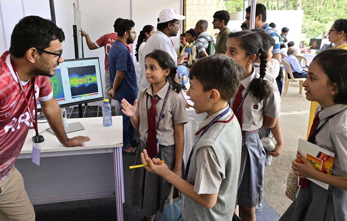 Children and visitors going through live science demonstrations, documentary film, Raman Museum and Archival Gallery at RRI campus on C.V. Raman Road in Bengaluru on Friday.