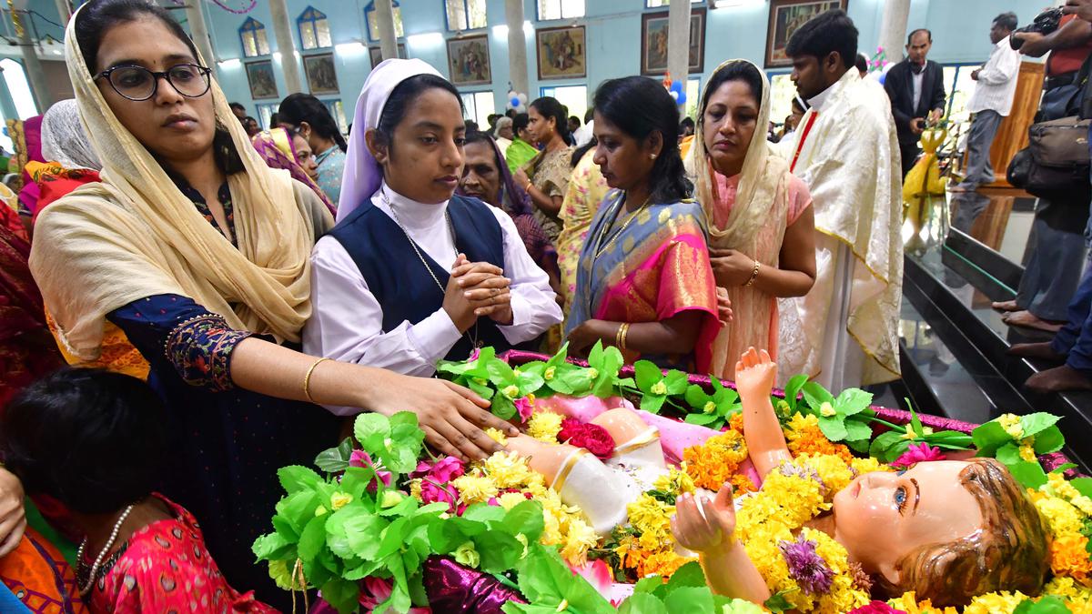 Churches wear a festive look as the devout offer special prayers marking Christmas