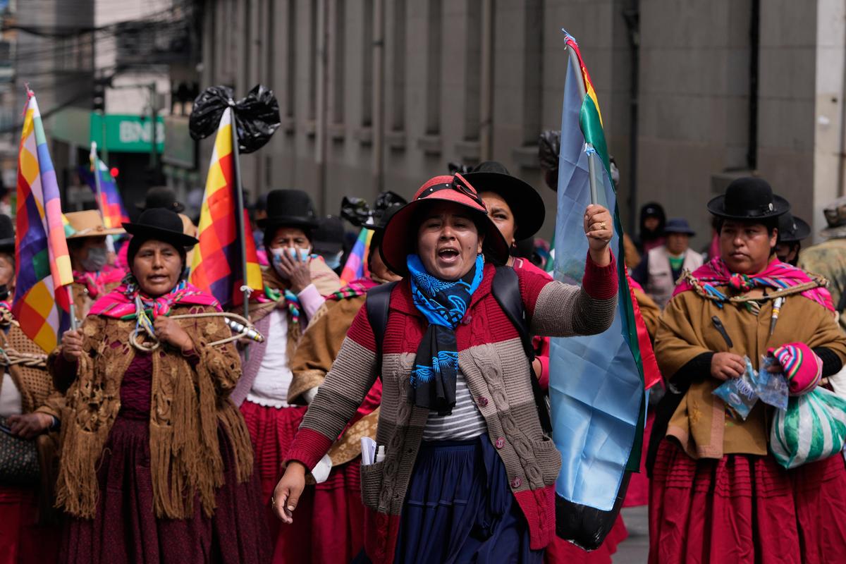 Demonstrators shout slogans during an anti-government protest in La Paz, Bolivia, on Friday, May 22, 2026.