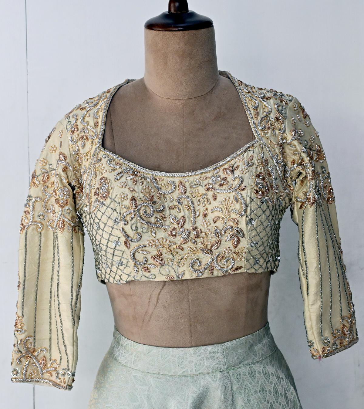 A few elegant pieces of handwork blouses at TANIHA design studio boutique in Madurai. 